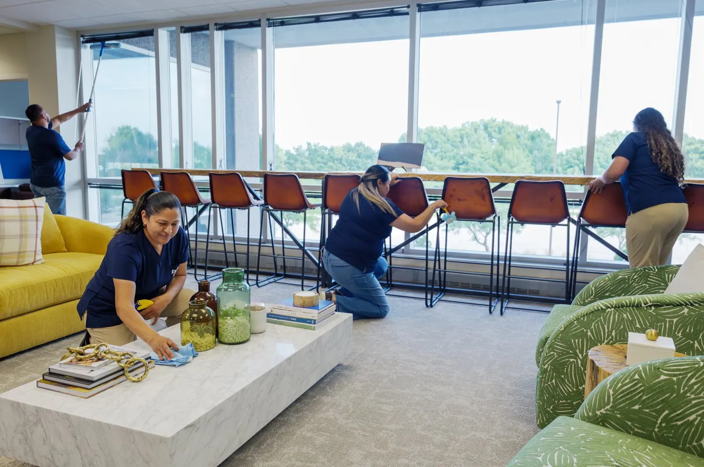 An ExtraClean team member cleaning an office